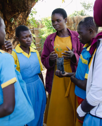 Edukans-2025-March-Malawi-Basic-Education-Eco-star-schools children students plant tree Teacher Jenipher Chingadza